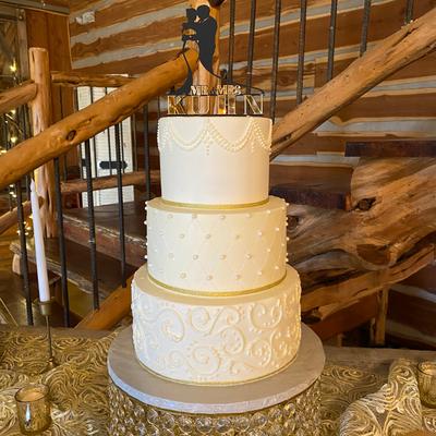 Classic three tier white wedding cake