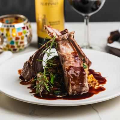 New Zealand lamb chops, served, front view.