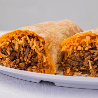 Asada Burrito filled with meat, rice and beans.