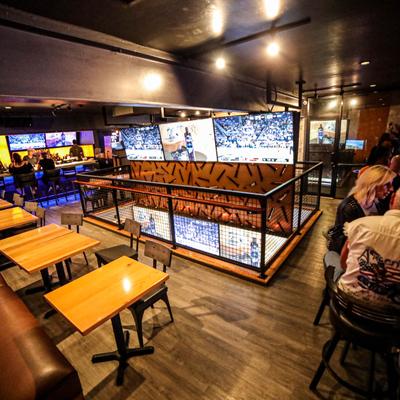 Interior, seating area with big TVs