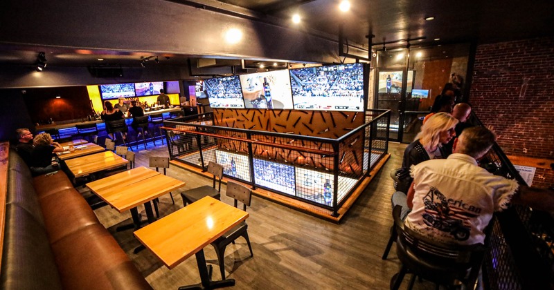 Interior, seating area with big TVs