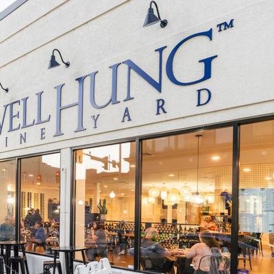 Restaurant sign above the windows, view of the interior.
