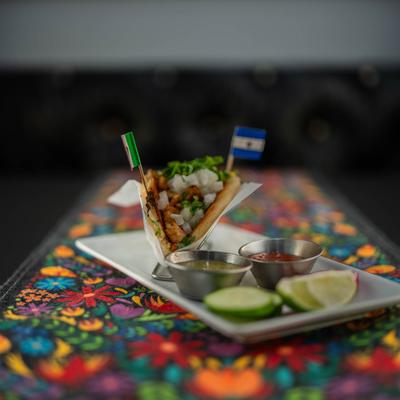 Chicken taco, with onions, cilantro, and salsa.