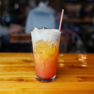 Orange and white cocktail.
