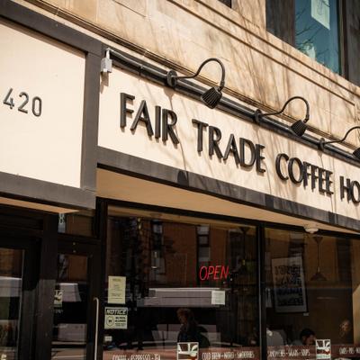 Close view of the storefront with a signage above the entrance.