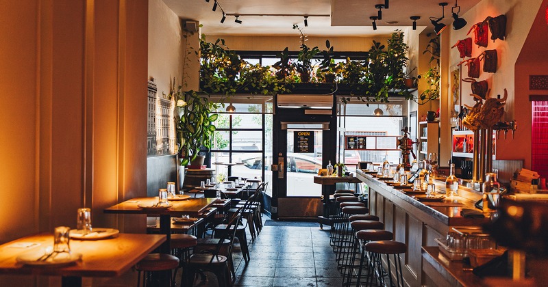 Restaurant interior, dining area, and bar area