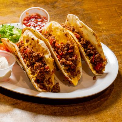 Served tacos on the plate.