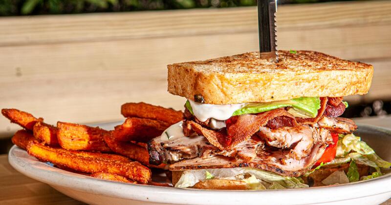 Club sandwich and fries