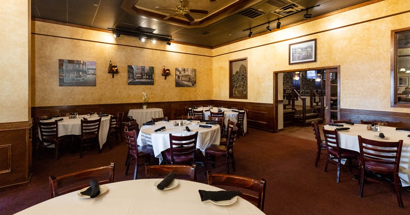 Interior, dining tables ready for guests