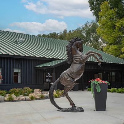 Exterior , horse statue in front of a building.