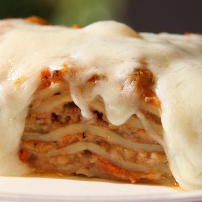 Lasagne alla Bolognese  Layers of house made pasta with beef, pork, mushrooms, Bechamel and Mozzarella mild or spicy.