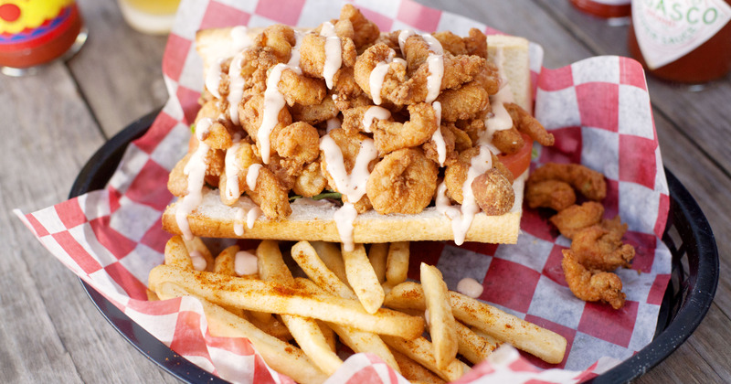 Fried Shrimp Sandwich with dressing and fries