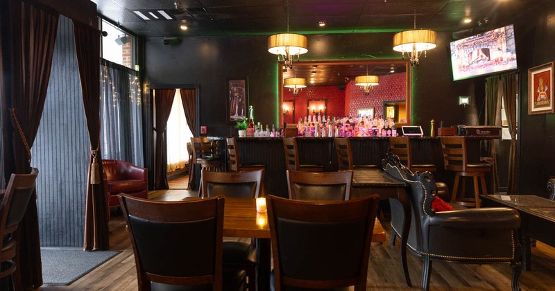 Decorated dining area, TV on the wall