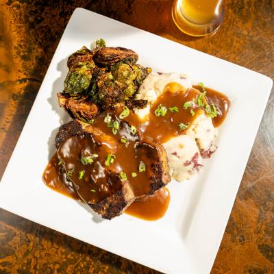 Meatloaf with mashed potatoes.