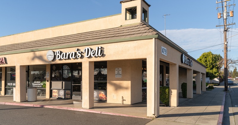 Exterior, front view to restaurant, parking lot