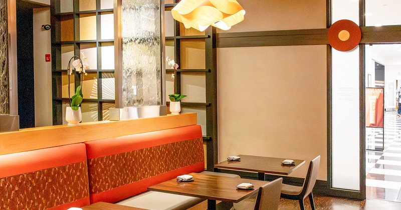 Nicely done interior dining area with tables ready for guests