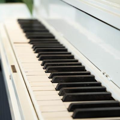 White piano, close-up.