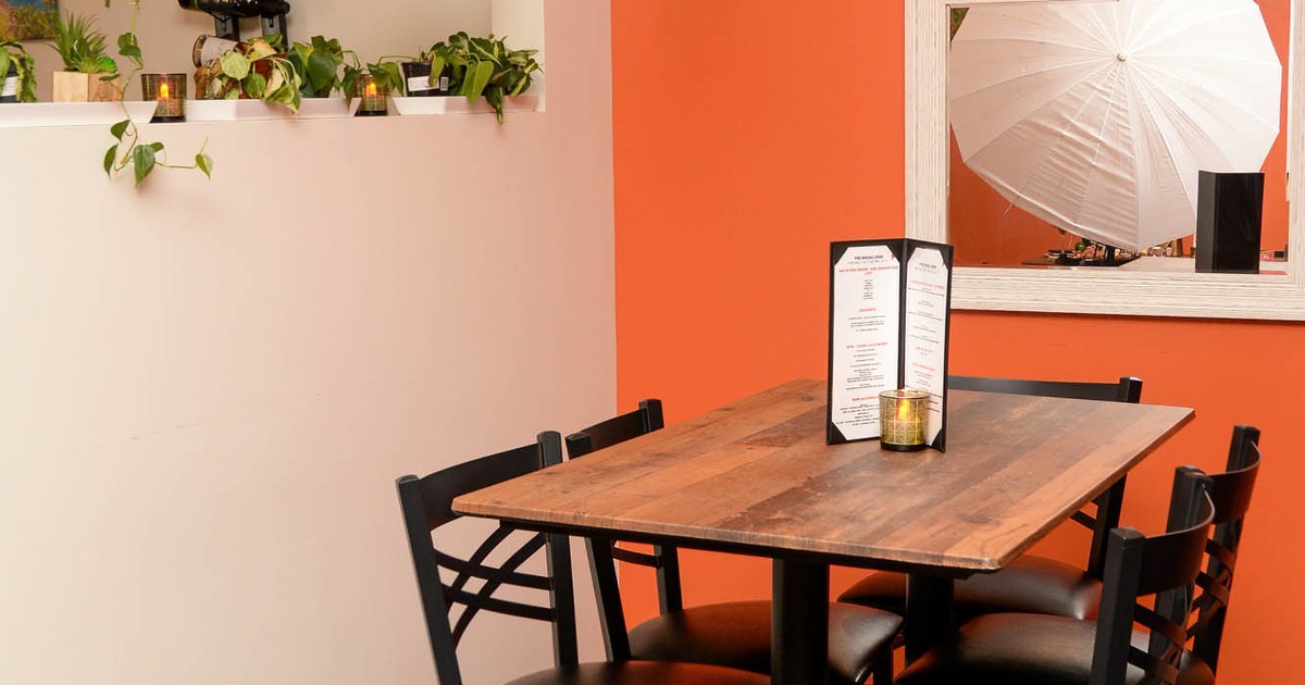 Tables and bar stools, flower decorations