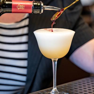 Bartender making a cocktail.