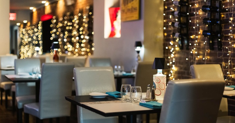 Interior, table set for guest in dining area