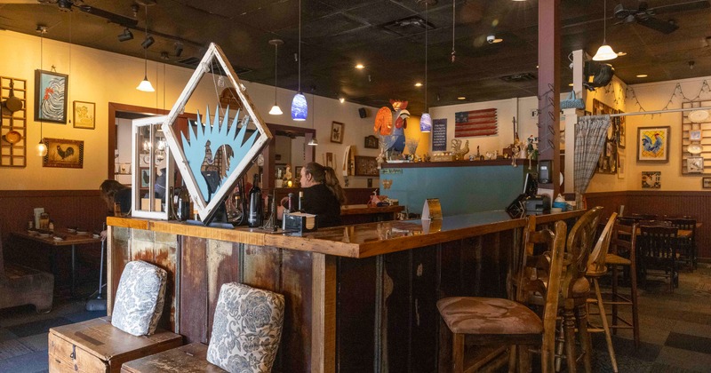 Bar, stools, bartenders