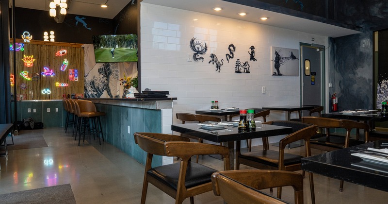 Interior of a sushi restaurant, dining area and bar area