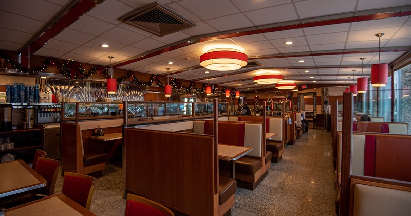 Interior, dining area, dining booths lined up