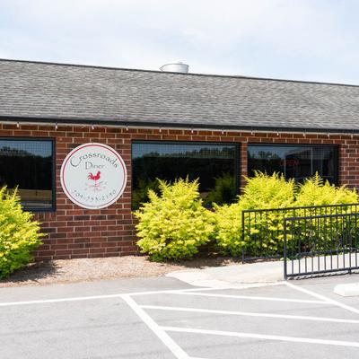 The parking outside of the diner.
