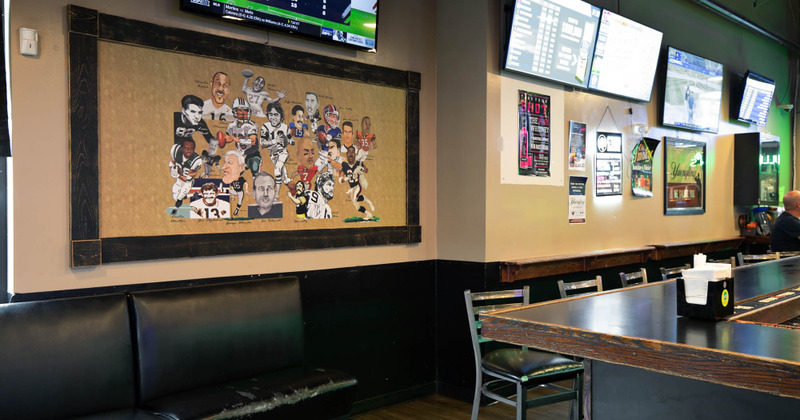 Interior, bar area on the right, TVs on the left