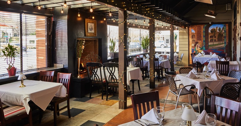 Cozy interior dining area with set tables