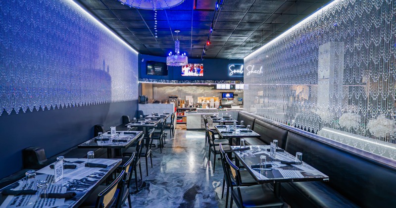 Interior, dining area with tables ready for guests