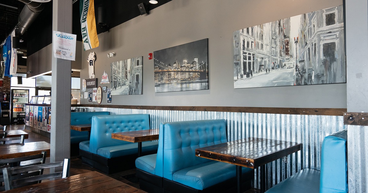 Interior space, seating area, upholstered booths lined up