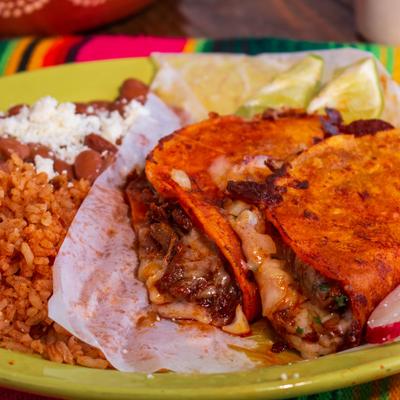 Cheese and birria tacos, with rice and beans.