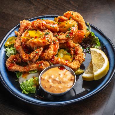 Fried caclamari served with sweet thai chili, sweet peppers and calabrian chili aioli.
