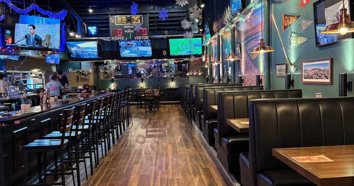 Interior with a mix of booth and counter seating and various decorations