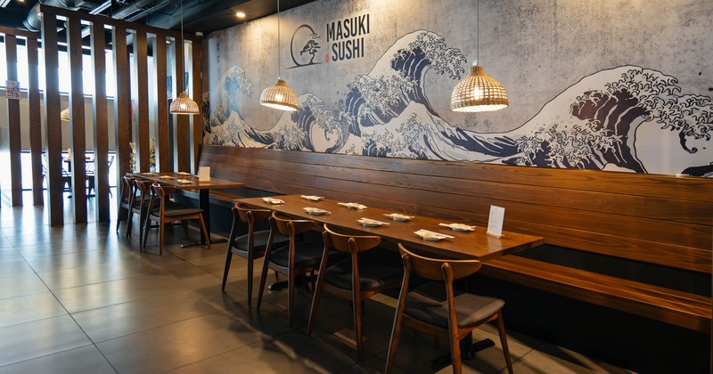 Interior, table served for guests with bench
