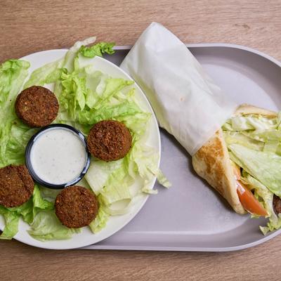 Beef lamb gyro with side of falafel croquettes.