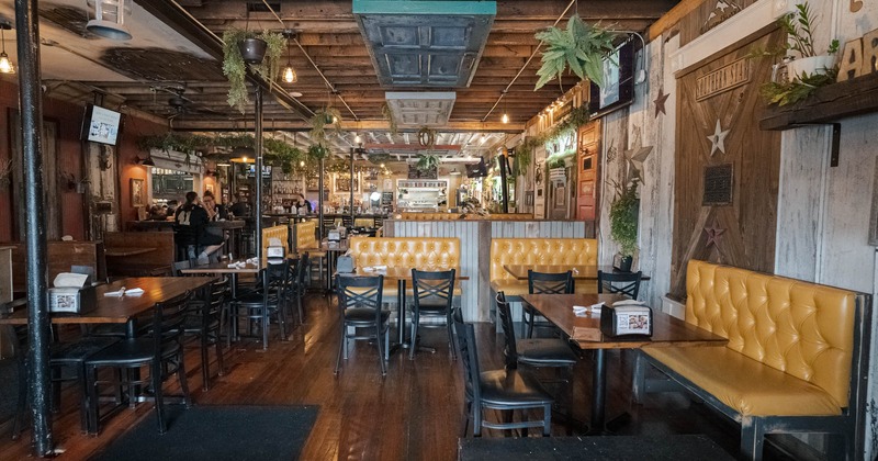 Interior, dining area, button tufted banquette seating, tables and chairs