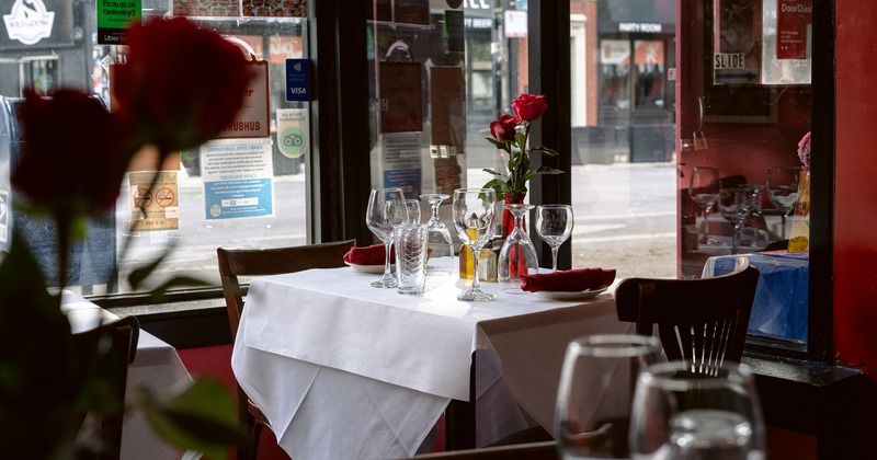 Small dining table set for two guests