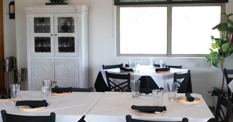 Interior, dining area with rustic cabinet in white