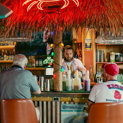 2 guests dining at the bar