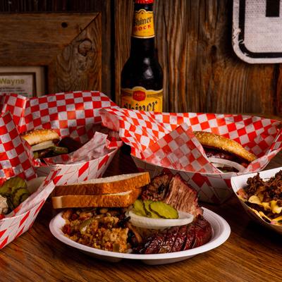 Assortment of dishes and beer.