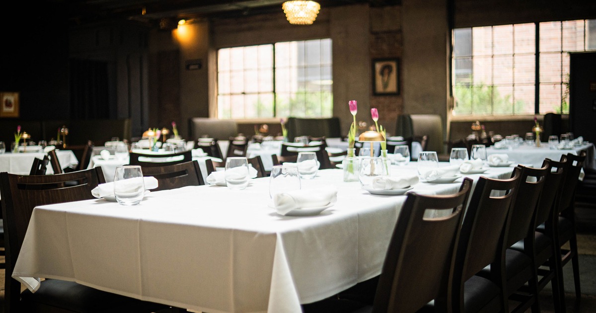 An elegant dining setup with a long table