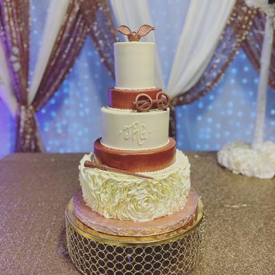 Brown and white naked cake with ruffled base