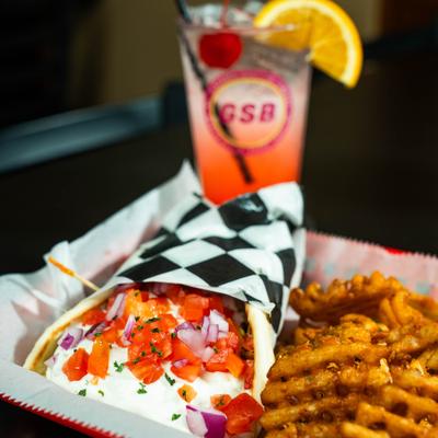 Gyro wrap and waffle fries.