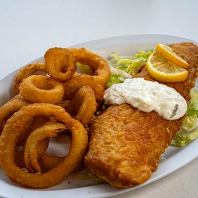 Fried fish with onion rings.