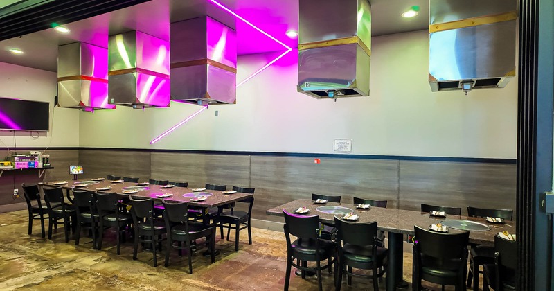 Interior, set tables and chairs ready for guests