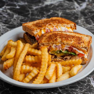 Club House Turkey BLT on Multi Grain, served with crinkle fries.