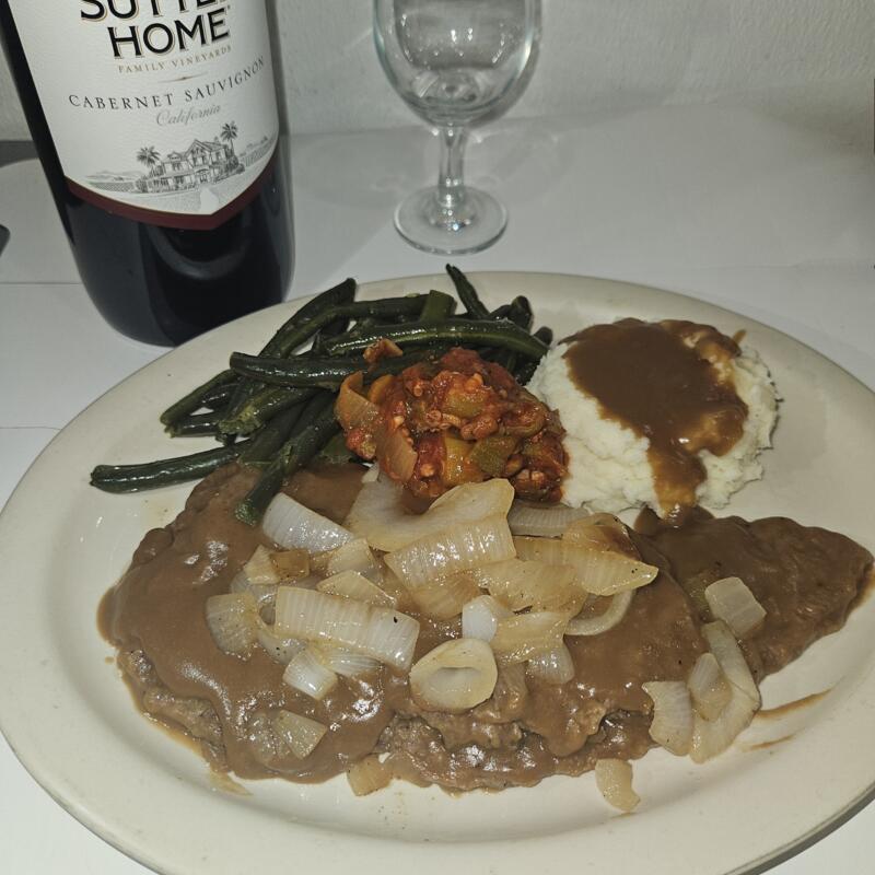 Hamburger Steak Topped with Grilled Onions, Grilled Mushrooms, & Raclette Cheese photo