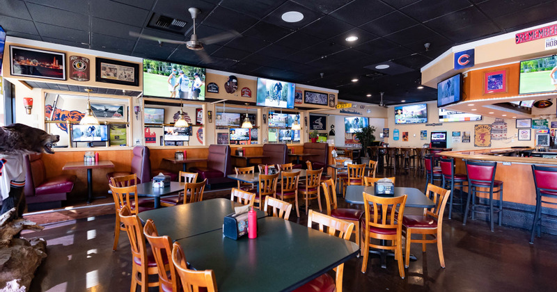 Interior, dining tables ready for guests